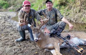 Tyler Knott and his father, Doug, with Junkyard, a behemoth non-typical both hunters pursued for nearly two years. (Photo: Doug Knott)