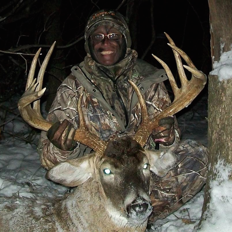 Valerie Hansen of Michigan with her 170-inch buck. Salute!