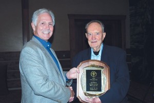 Gail Martin, right, during his induction into the Archery Hall of Fame.