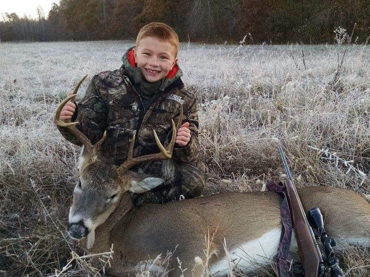 This is one happy youngster with his Kentucky buck. Congrats! 