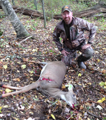 Deer & Deer Hunting Editor-in-Chief Dan Schmidt with his first whitetail taken with a crossbow. (photo by Tracy Schmidt)